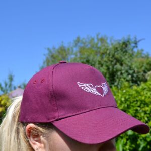 image of person wearing a Haileybury baseball cap