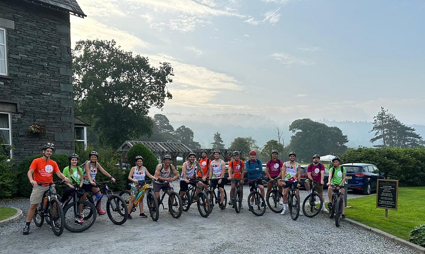 Image of Chris Webster (L 97) and his team of fundraising cyclists in the Lake District