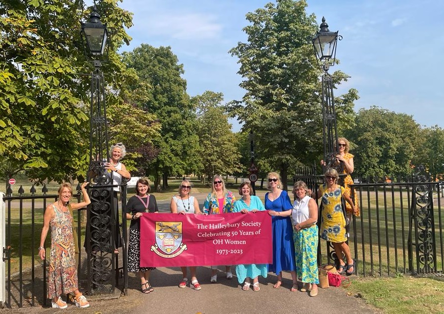 Image of girls 50 year reunion outside the gates of Haileybury in 2023