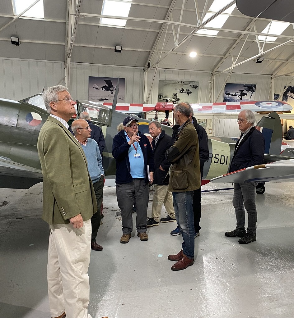 Image of OHs being shown a Spitfire at Shuttleworth