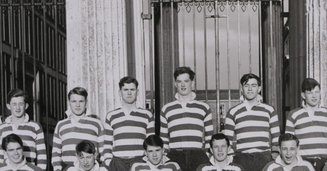 Image of 1957 Haileybury Rugby XV with William Naesmyth of Posso shown at the back (centre)