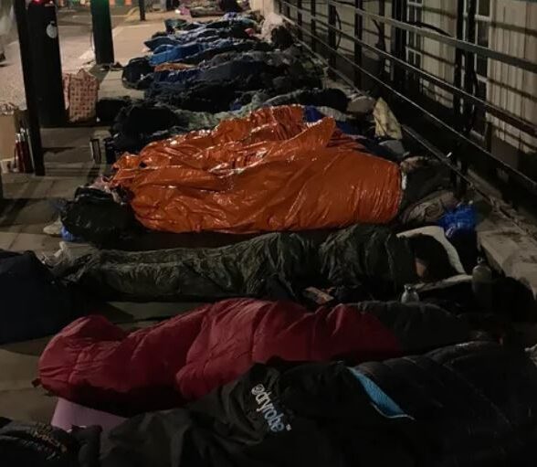 Image of people sleeping out for charity.